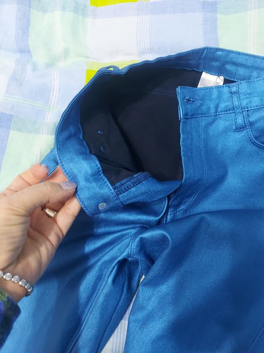 Pantaloni eleganti luciosi