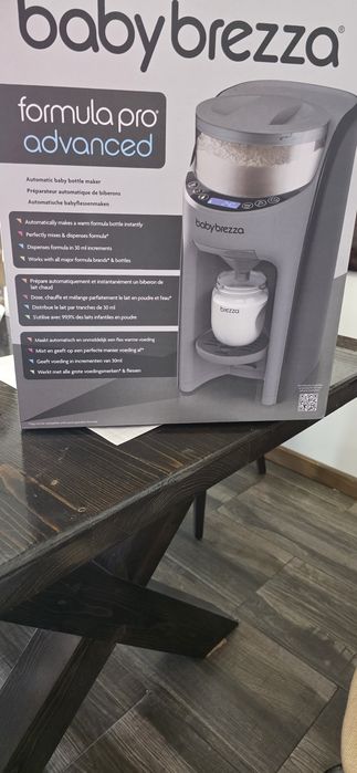 Babybrezza уред за мляко