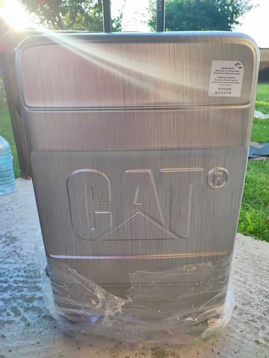 Vând troller CAT 52.2 litri
