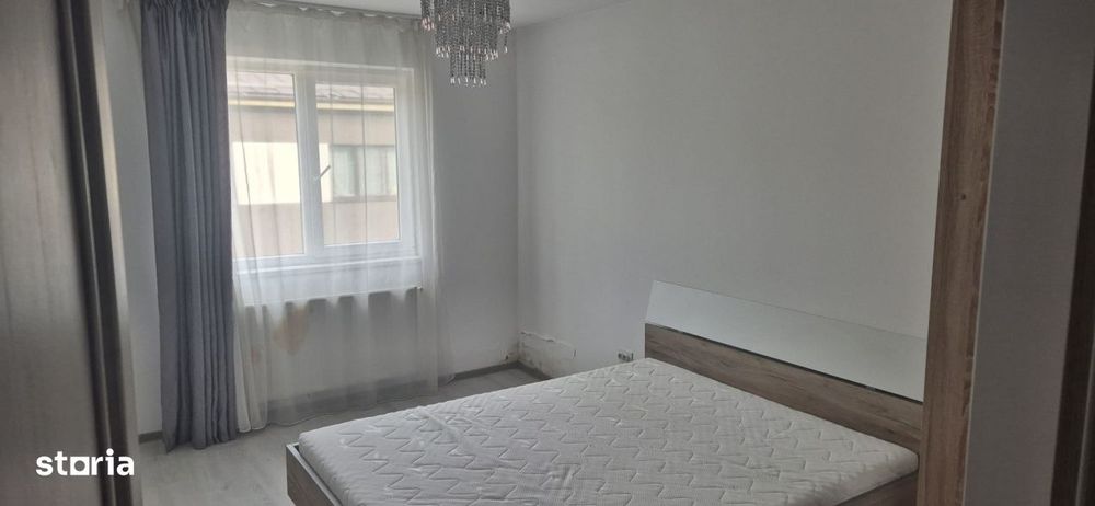 Apartament cu doua dormitoare, parcare proprie, mobilat si utliat — fotografia 3