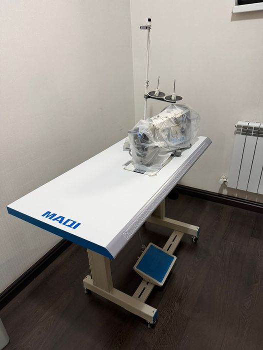 Новая швейная машина