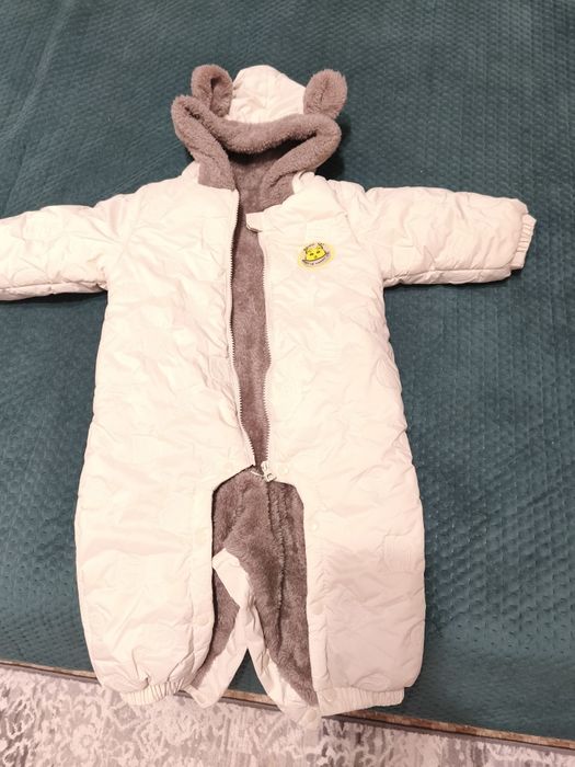 Продам детский комбинезон на весну