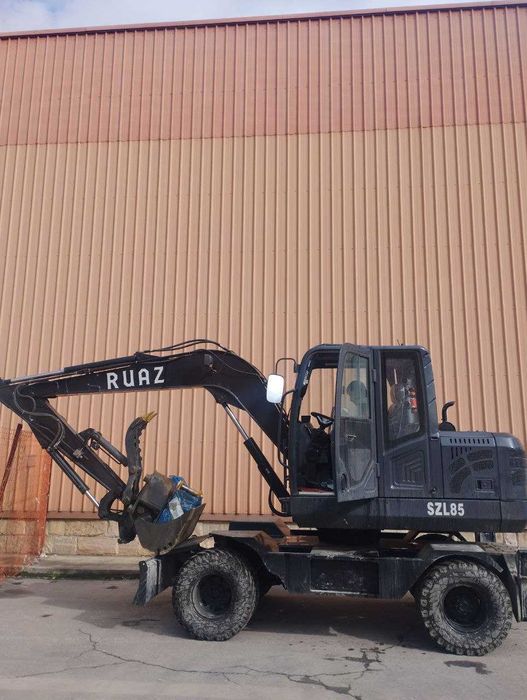 Колёсный экскаватор 0.3