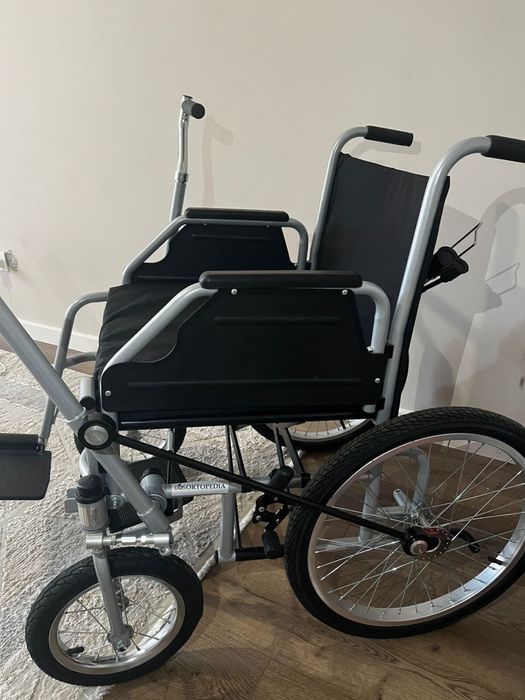 Инвалидная коляска с рыжачным приводом