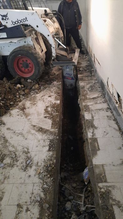 Bobcat de inchiriat Taiere beton gauri gard burghiu pamant sfredel