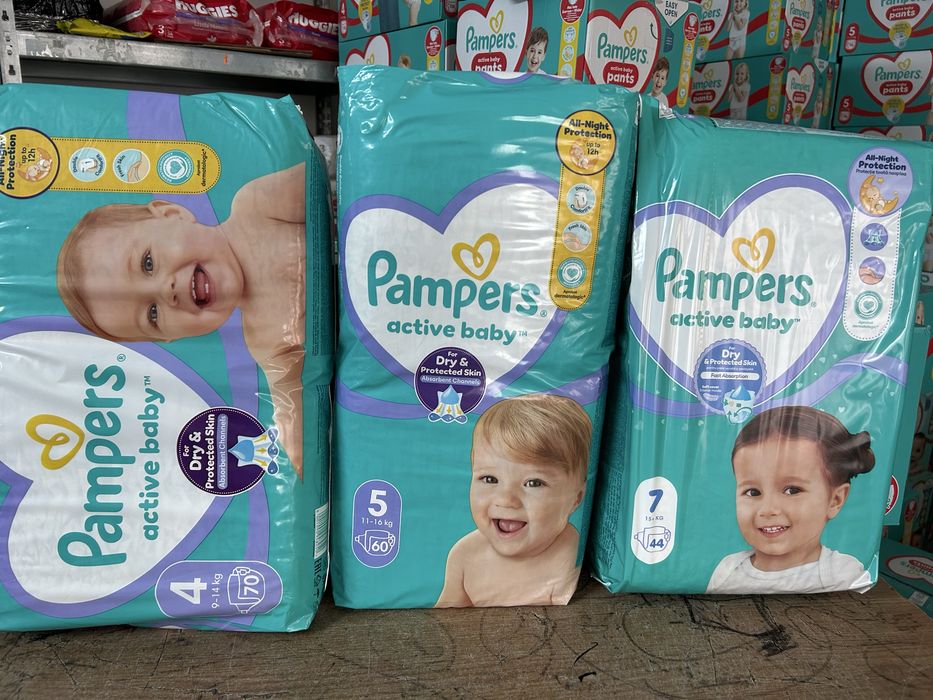 Firma vinde Scutece Pampers și Huggies la pret de importator