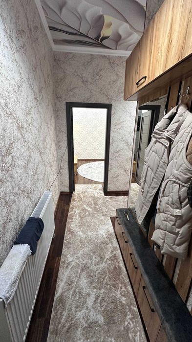 2 хона килинган+подвалиниям уй килган квартира сотилади 5 микрн