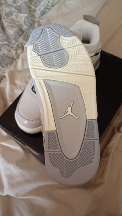 Jordan 4 Frozen Moments