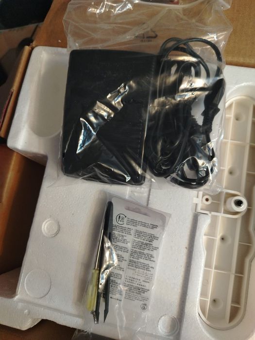 Masina de cusut si surfilat SINGER