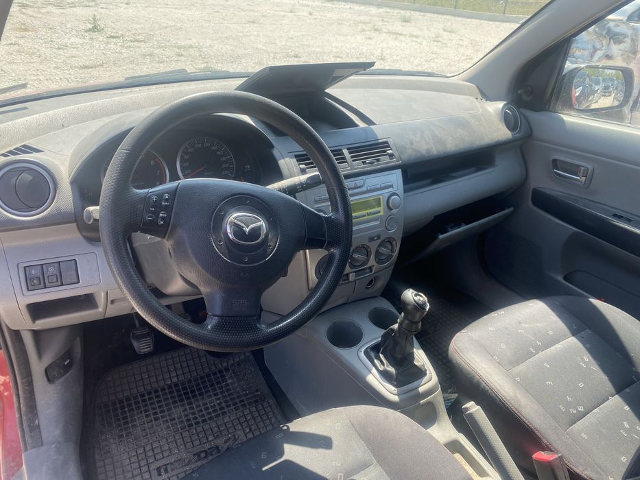 Мазда 2 1.25 на части