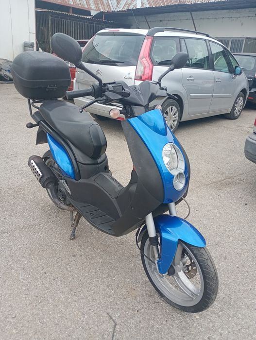 Peugeot скутер ..