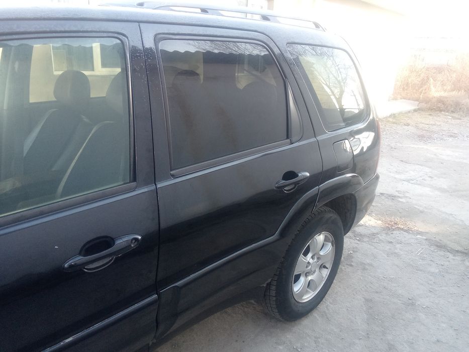 Продам срочно Mazda Tribute
