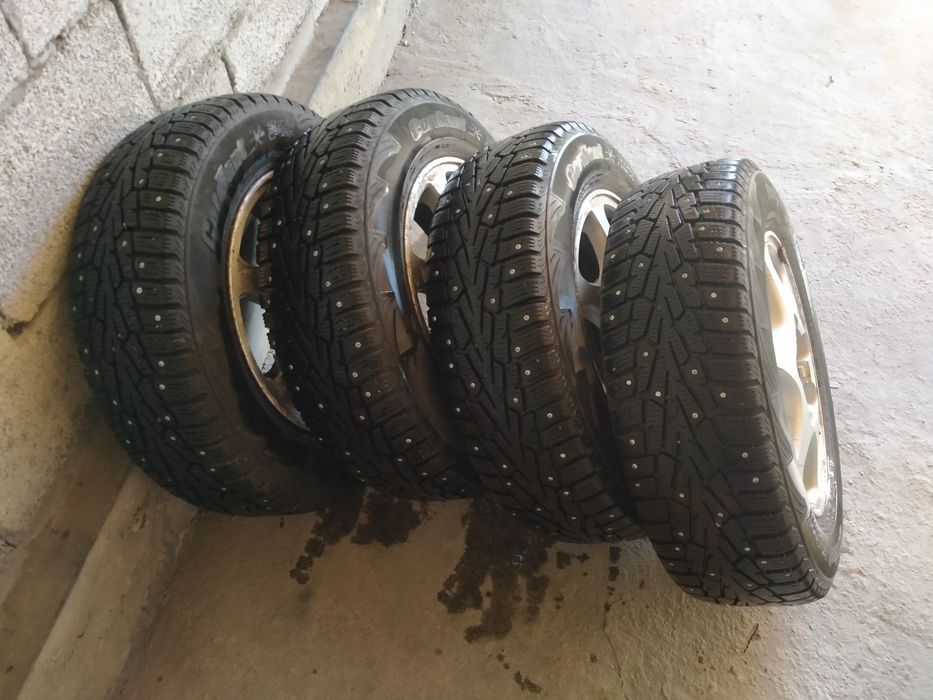 Продам зимнюю покрышку размер