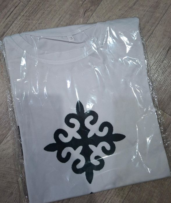 Продам новые футболки