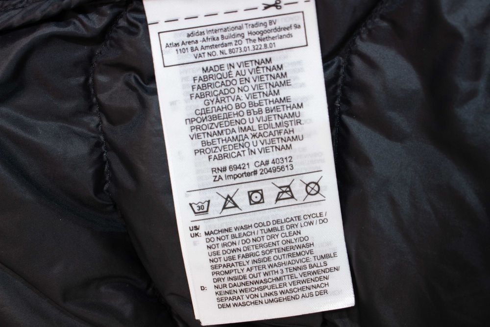 Reebok оригинална дамска грейка пухена елек черен с пух и пера XS