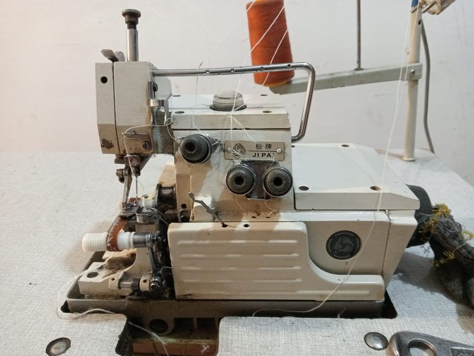 Швейный сторон Оверлок