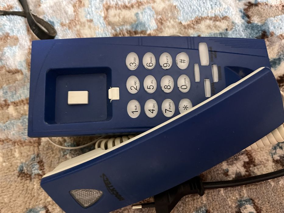 Телеыон кнопочный