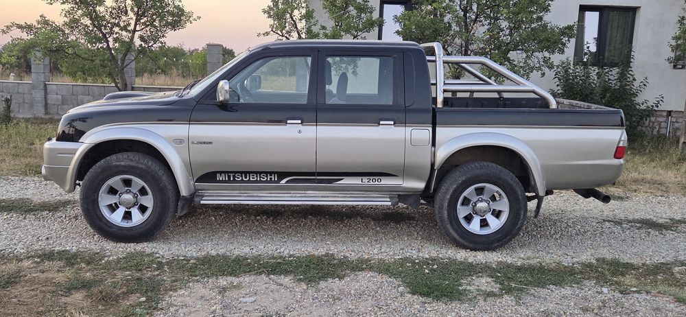 Mitsubishi L 200 climatronic 4x4 cuplaj la mare la mic Diferitial blocabil la buton