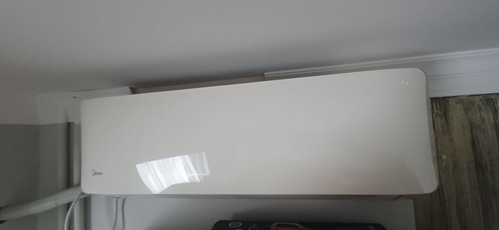 Кондиционер.Midea