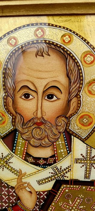 Icoană religioasă pictată pe sticlă.