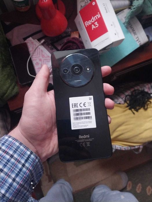 Телефон Редми 03