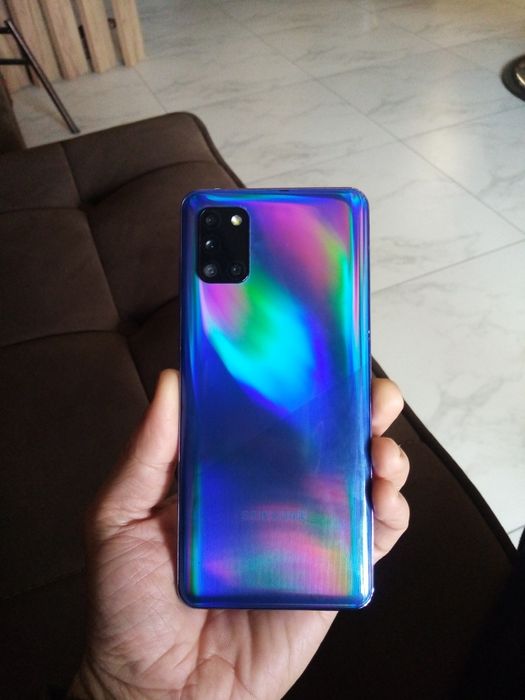 Samsung A31 64 gb xolati tiniq