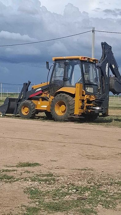 Услуги трактора погрузчика эксковатора