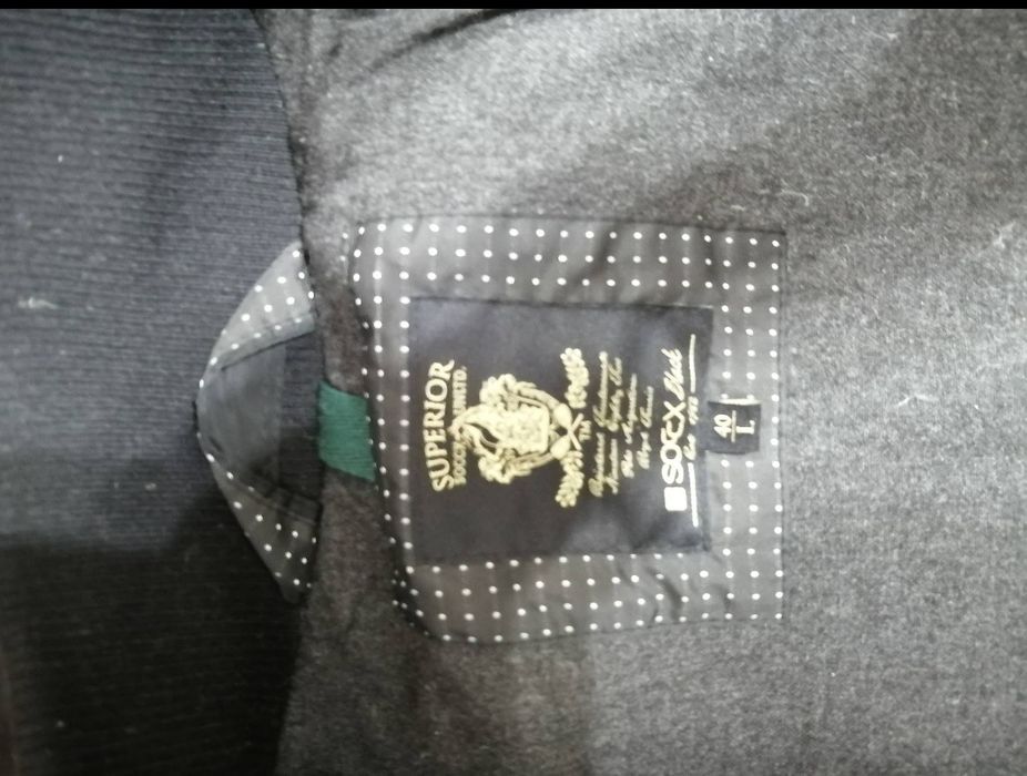 Фирменный пуховик  Soccx