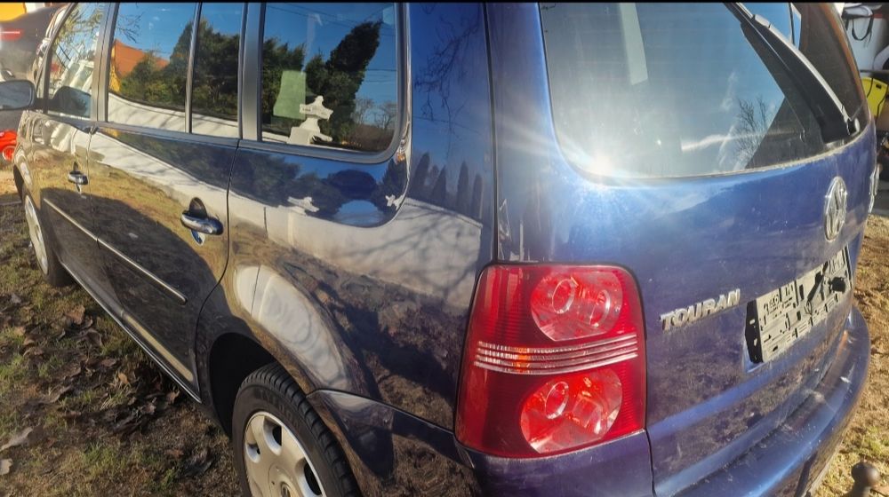 Vw touran 2.0 2009 cu 7locuri vand schimb