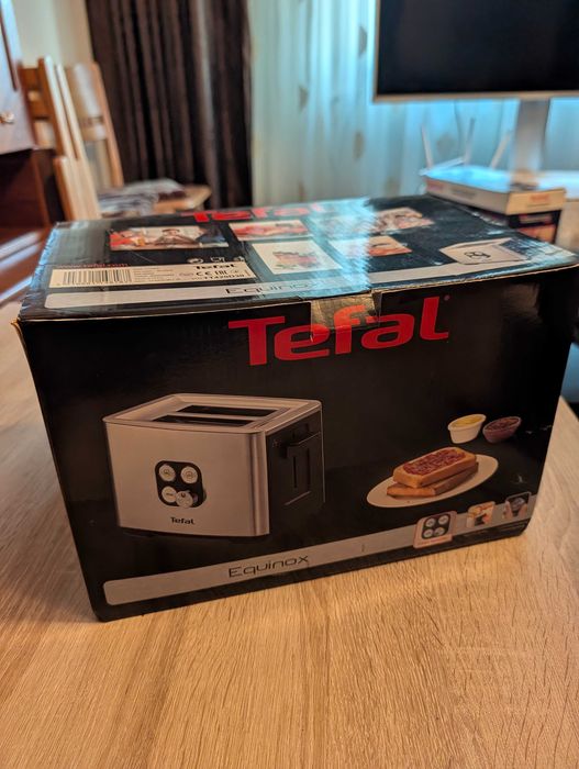 Prajitor de paine Tefal TT420D30, 900W, Functie de dezghetare si reincalzire, 7 niveluri, Inox/Negru