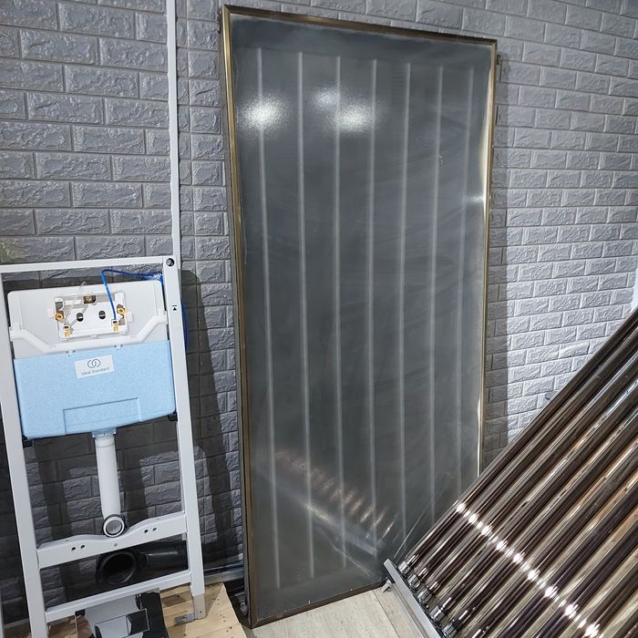 Солнычный водонагреватель панельный.