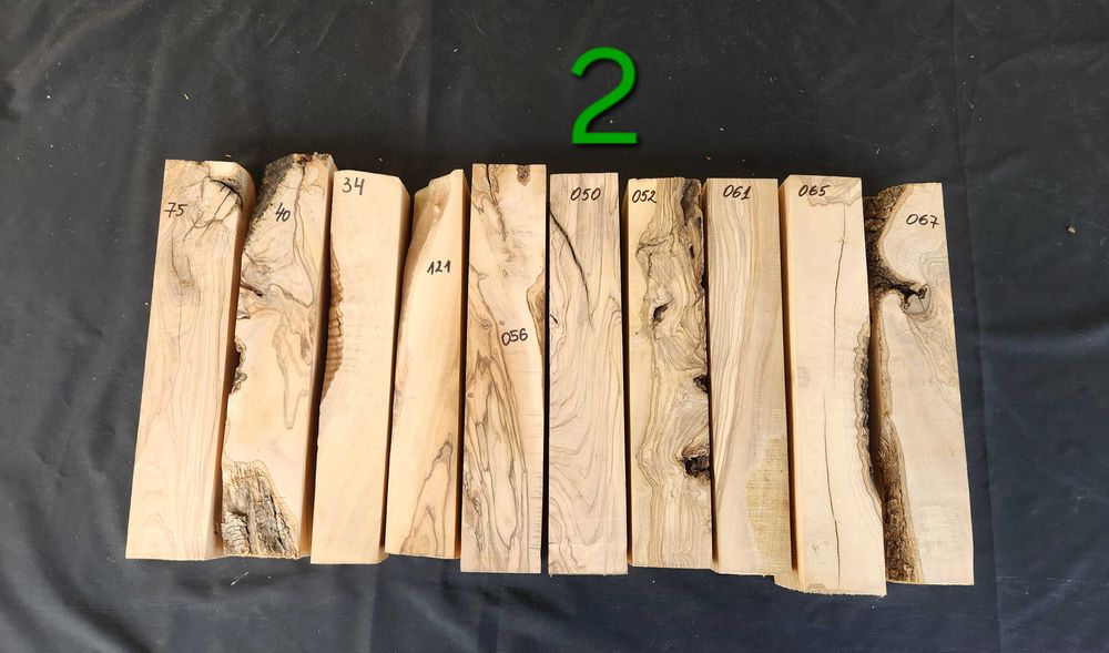 Заготовки (трупчета) от маслиново дърво (дървен материал)