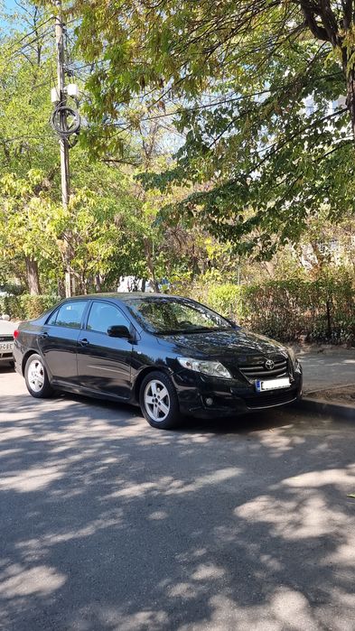 Toyota corolla  1.6  cu două seturi de jante