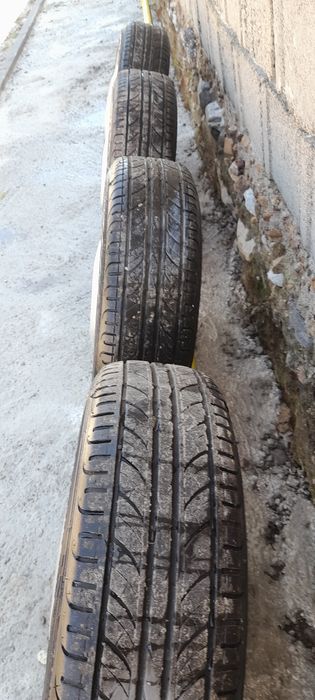 Jante aluminiu  + anvelope cu profil impecabil 175 65 R 14 OPEL