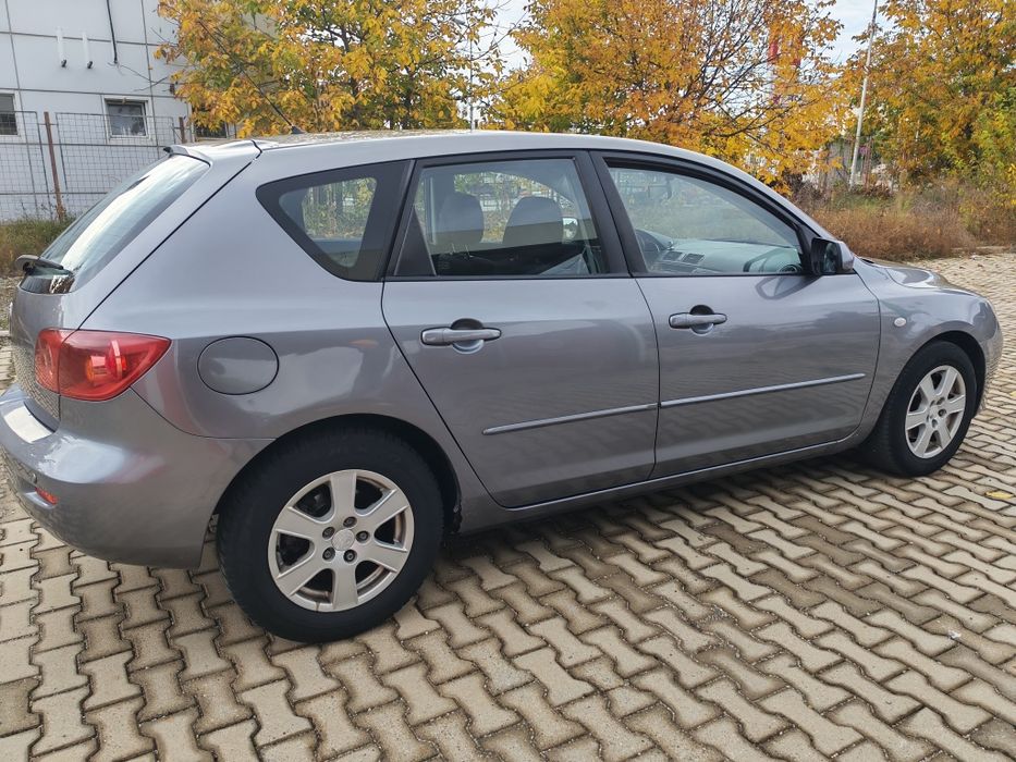 Mazda 3 2006 benzină, 1.400 € — imagine 11