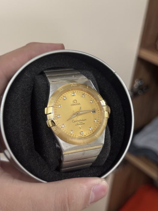 Часы Omega новый