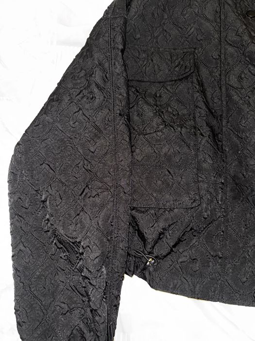 Черная ветровка с большими карманами