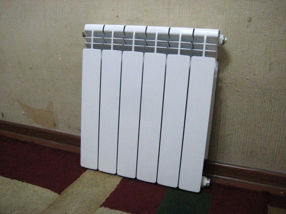 Радиатор биметаллический 6 ребра оригинал Италия 8х10х56 почти новая