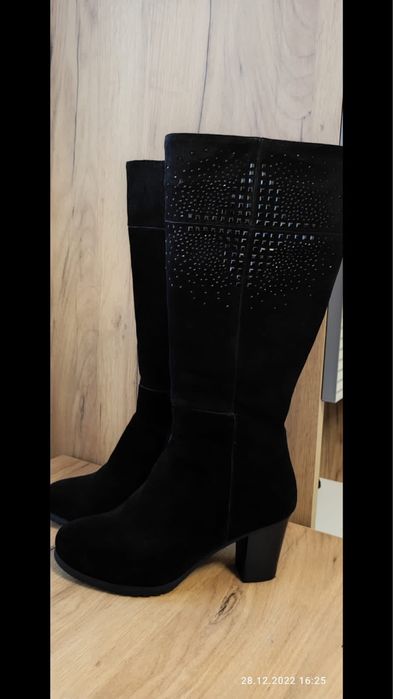 Продам новые сапоги