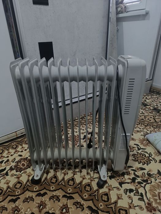 Масляный радиатор-обогреватель,с вентилятором марки Volto