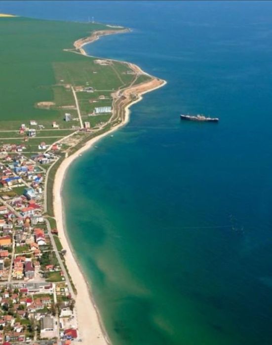 Teren nibiru de vanzare pe partea marii