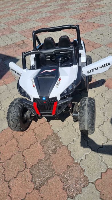 Masinuta electrica Xtreme Jumper UTV-MX White cu telecomanda 150W, doua locuri si roti Eva, unitate audio cu slot card si usb