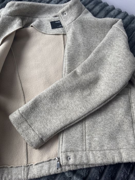 Чисто ново късо палто