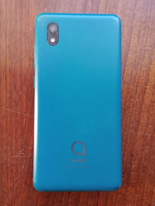 Алкател телефон 32 гб.