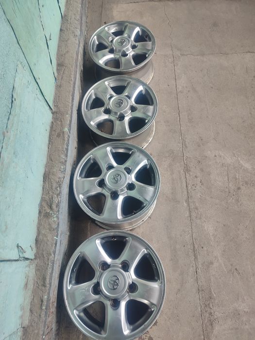 Продам  16 оригинальные диски на ланд Крузер 100