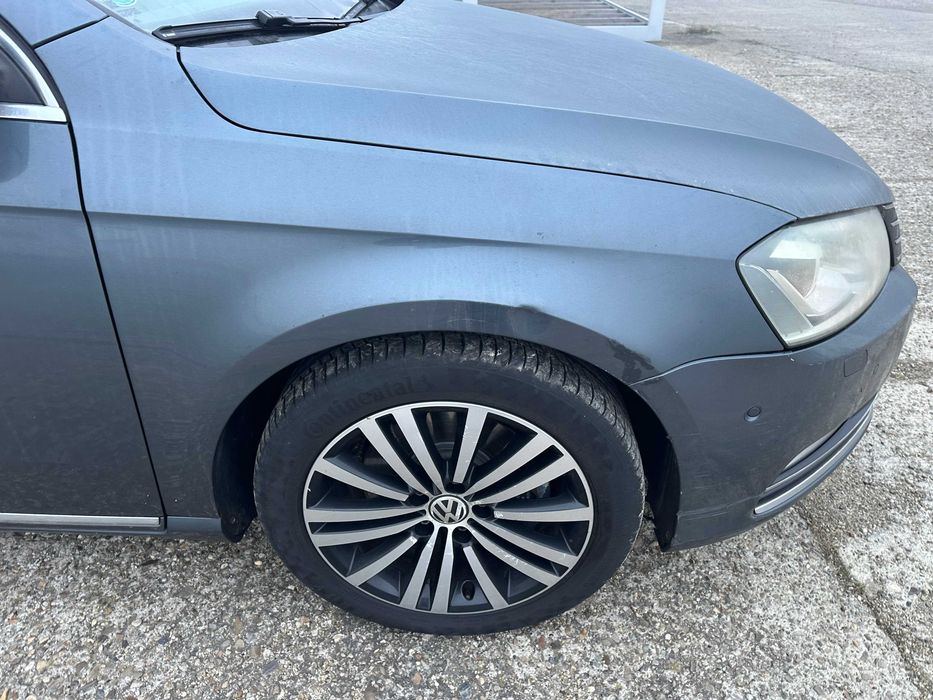 Aripa dreapta fata vw passat b7 gri cod LK7X cu mic defect