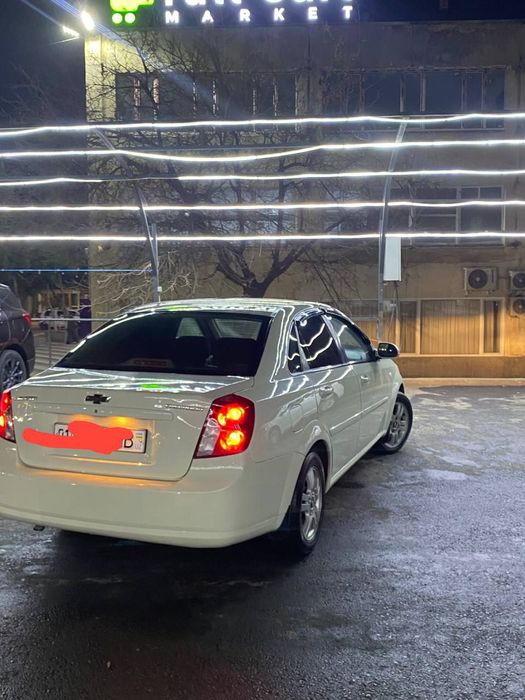 Lasetti 2012 avtamat 1 qol sotiladi