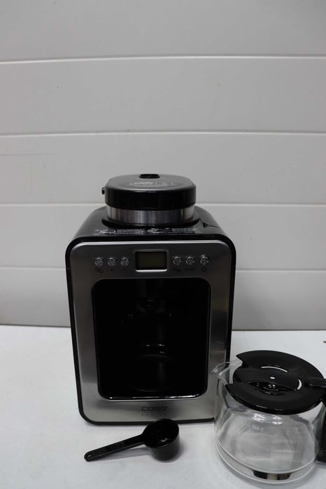 Компактна шварц кафемашина CASO Coffee с мелачка, 4 чаши кафе, подходяща и за предварително смляно кафе, LCD дисплей, таймер