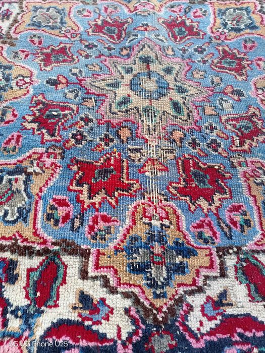 Ръчно тъкан килим