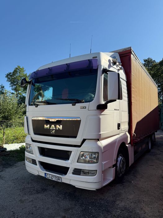 Man (camion tandem) tgx 24440,cu axa spate viratoare